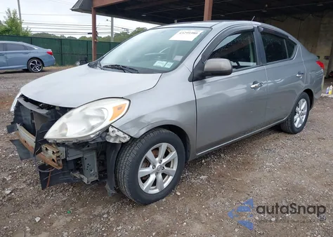 2012 Nissan Versa 1.6 Sl z USA, uszkodzony, nr VIN 3N1CN7AP9CL815973